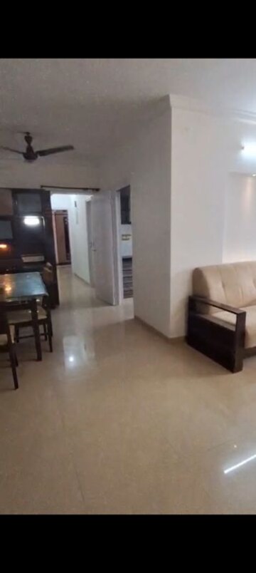 Living Room in 2 BHK Apartment at Goyal Green Woods, Andheri East – for Sale