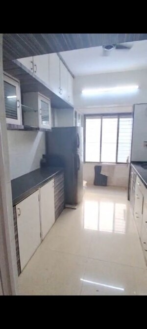 Kitchen in 2 BHK Apartment at Goyal Green Woods, Andheri East – for Sale