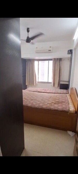Bedroom in 2 BHK Apartment at Goyal Green Woods, Andheri East – for Rent