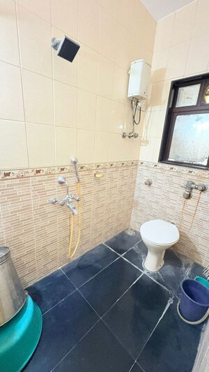 Bathroom in 2 BHK Apartment at Atul Trans Residency, Andheri East – for Rent