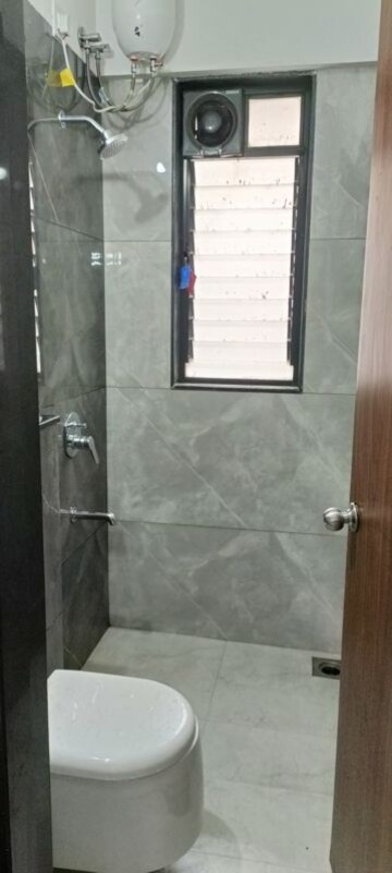 Bathroom in 2 BHK Apartment at Manisha Apartment Law College Road, Law College Road – for Rent