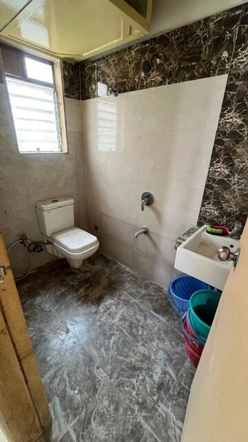 Bathroom in 2 BHK Apartment at Lotus Tower CHS, Kalyan West – for Sale