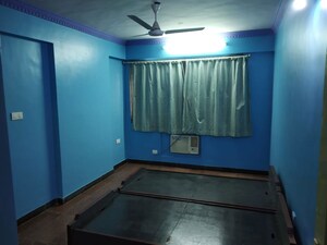 Bedroom in 2 BHK Apartment at HDIL Dheeraj Kiran, Malad West – for Rent