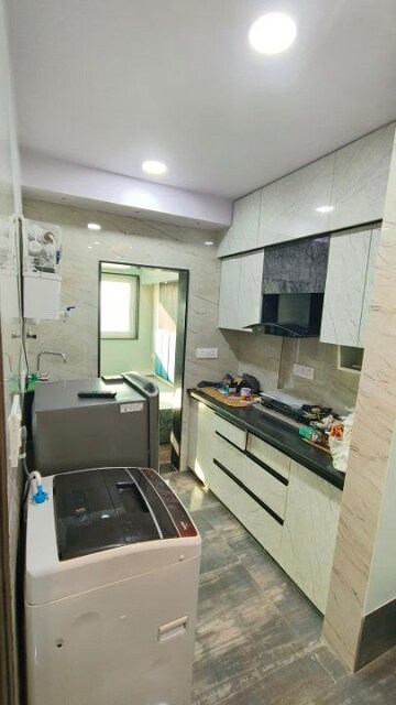Kitchen in Studio Apartment at DLF One Midtown, Moti Nagar – for Sale