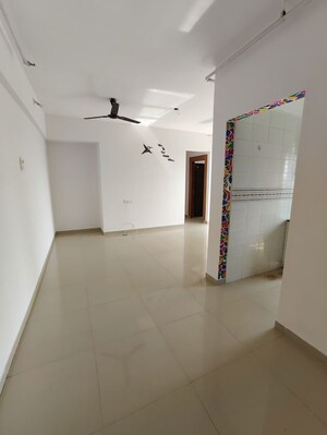 Living Room in 2 BHK Apartment at Tanvi Eminence, Mira Road – for Rent