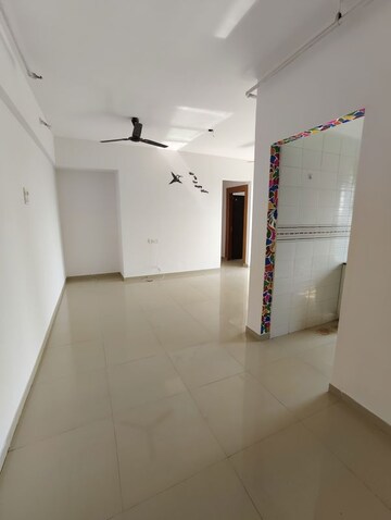 Living Room in 2 BHK Apartment at Tanvi Eminence, Mira Road – for Rent