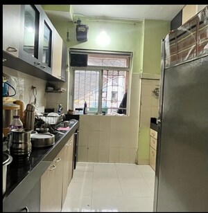Kitchen in 2 BHK Apartment at New Brahmand Phase 7 CHS, Brahmand – for Sale