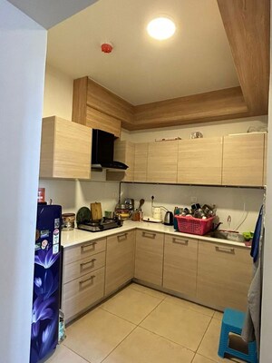 Kitchen in 1.5 BHK Apartment at Bhartiya Nikoo Homes Phase 2, Thanisandra Main Road – for Sale