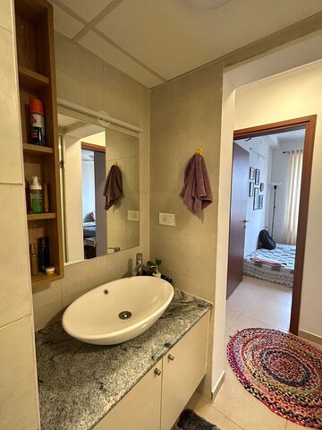 Bathroom in 1.5 BHK Apartment at Bhartiya Nikoo Homes Phase 2, Thanisandra Main Road – for Sale