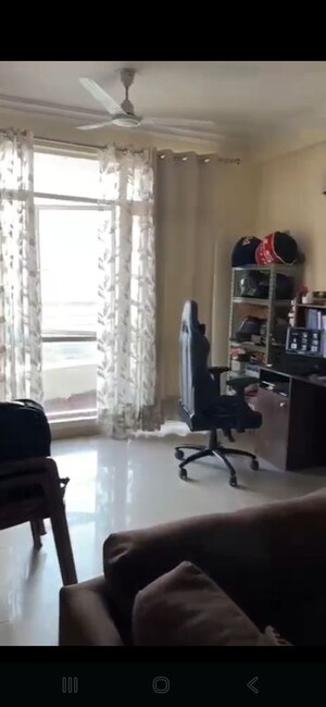 Living Room in 2 BHK Apartment at Raheja Vedaanta, Sector 108 – for Rent