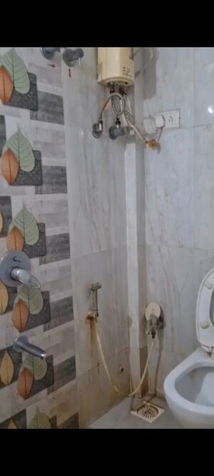 Bathroom in 1 BHK Apartment at Amogh Adjure Apartment, Vile Parle East – for Rent