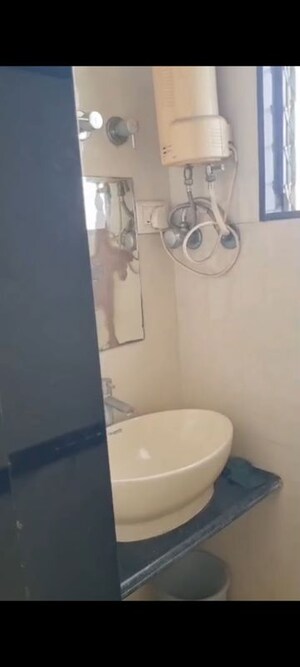 Bathroom in 1 BHK Apartment at Amogh Adjure Apartment, Vile Parle East – for Rent