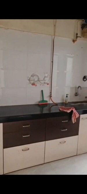 Kitchen in 1 BHK Apartment at Amogh Adjure Apartment, Vile Parle East – for Rent
