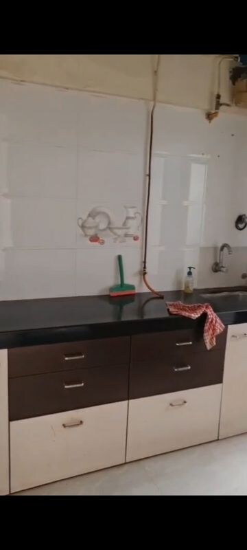 Kitchen in 1 BHK Apartment at Amogh Adjure Apartment, Vile Parle East – for Rent