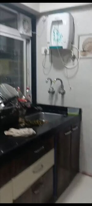 Kitchen in 1 BHK Apartment at Zee Usha Niketan, Vile Parle East – for Rent