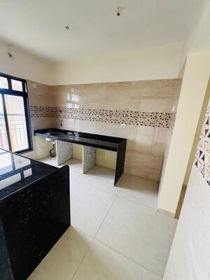 Kitchen in 3 BHK Apartment at Group Seven Rushi Heights, Goregaon East – for Rent