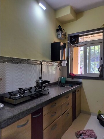 Kitchen in 1 BHK Apartment at Siddhi Highland Gardens, Dhokali – for Sale