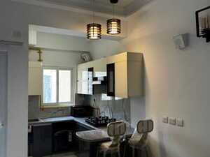 Kitchen in 3 BHK Apartment at Purvanchal Royal City, Chi V Greater Noida – for Sale