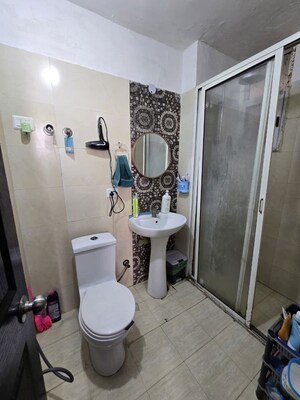 Bathroom in 2 BHK Apartment at Prateek Wisteria, Sector 77 – for Sale