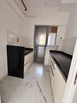 Kitchen in 1 BHK Apartment at Dynamix Avanya, Ketkipada – for Rent