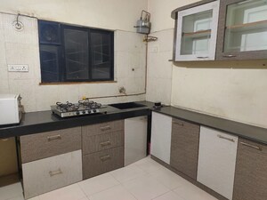 Kitchen in 2 BHK Apartment at Kumar Periwinkle, Kharadi – for Rent