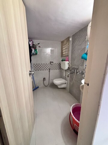 Bathroom in 2 BHK Apartment at Unique Aurum 2, Chandan Shanti – for Sale