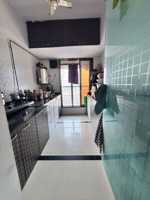 Kitchen in 2 BHK Apartment at Unique Aurum 2, Chandan Shanti – for Sale