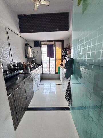 Kitchen in 2 BHK Apartment at Unique Aurum 2, Chandan Shanti – for Sale
