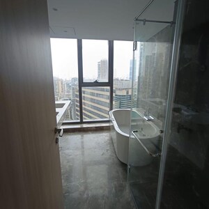 Bathroom in 4 BHK Apartment at Rustomjee Crown, Gokhale Road – for Rent