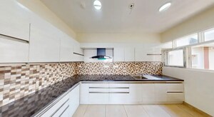 Kitchen in 2 BHK Apartment at Prestige Lakeside Habitat Villas, Whitefield – for Sale