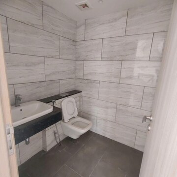 Bathroom in 4 BHK Apartment at Rustomjee Crown, Gokhale Road – for Rent