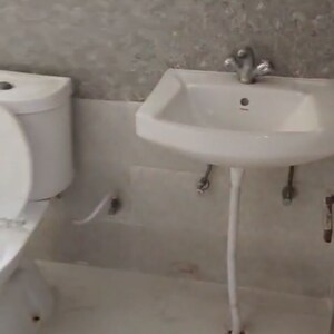 Bathroom in 2 BHK Apartment at Amrapali Kingswood, Haibatpur – for Sale