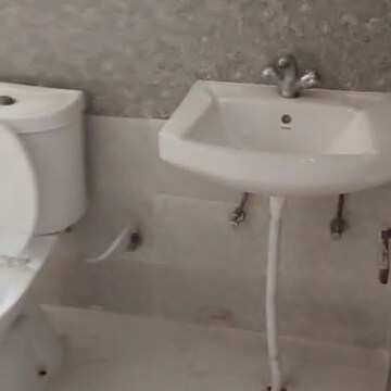 Bathroom in 2 BHK Apartment at Amrapali Kingswood, Haibatpur – for Sale