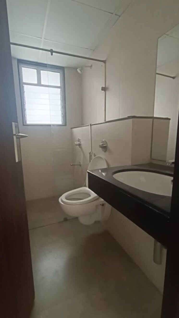 Bathroom, bhandari-7-plumeria-drive 2 Bedroom 906 Sq.Ft. Apartment In Tathawade Pune 9738062
