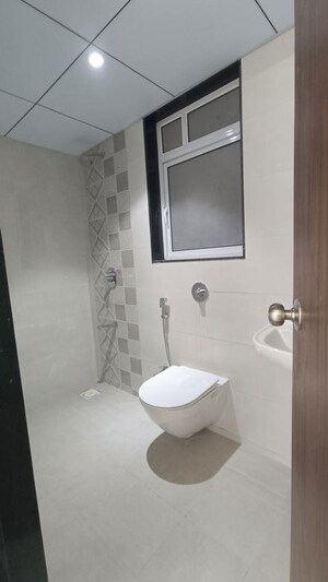 Bathroom in 3 BHK Apartment at Jhamtani Ace Abode, Kiwale – for Sale