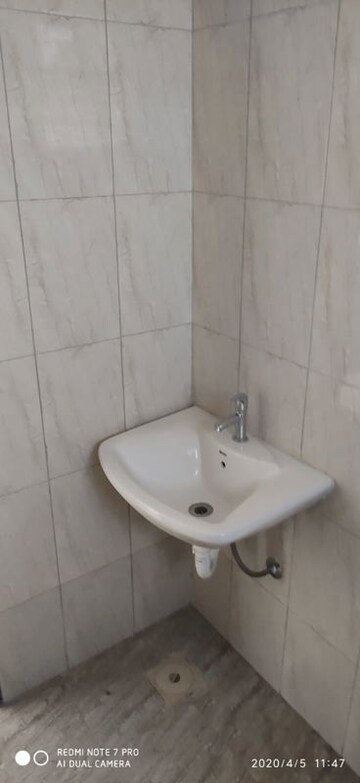 Bathroom in Studio Apartment at Paranjape Richmond Park, Rahatani – for Sale