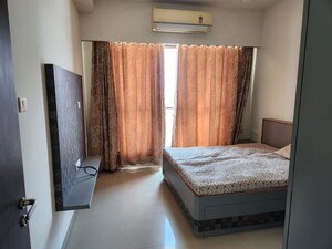 Living Room in 2 BHK Apartment at Ruparel Ariana, Parel – for Rent