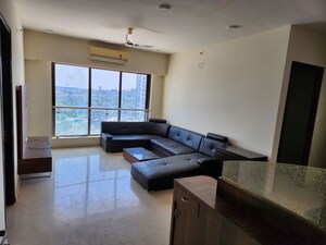 Living Room in 2 BHK Apartment at Ruparel Ariana, Parel – for Rent