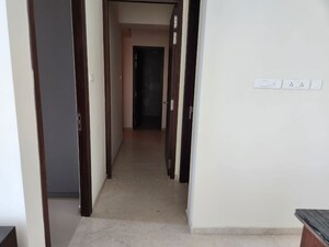 Building Lobby in 2 BHK Apartment at Ruparel Ariana, Parel – for Rent
