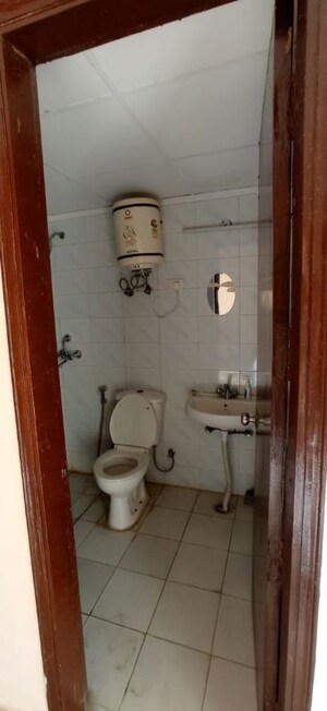 Bathroom in 3 BHK Apartment at Landcraft Golflinks Plaza, Pandav Nagar – for Rent