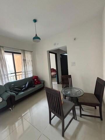 Living Room in 1 BHK Apartment at Shapoorji Pallonji Joyville Hinjewadi, Hinjewadi – for Rent