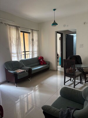 Living Room in 1 BHK Apartment at Shapoorji Pallonji Joyville Hinjewadi, Hinjewadi – for Rent