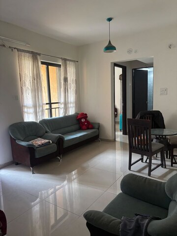 Living Room in 1 BHK Apartment at Shapoorji Pallonji Joyville Hinjewadi, Hinjewadi – for Rent