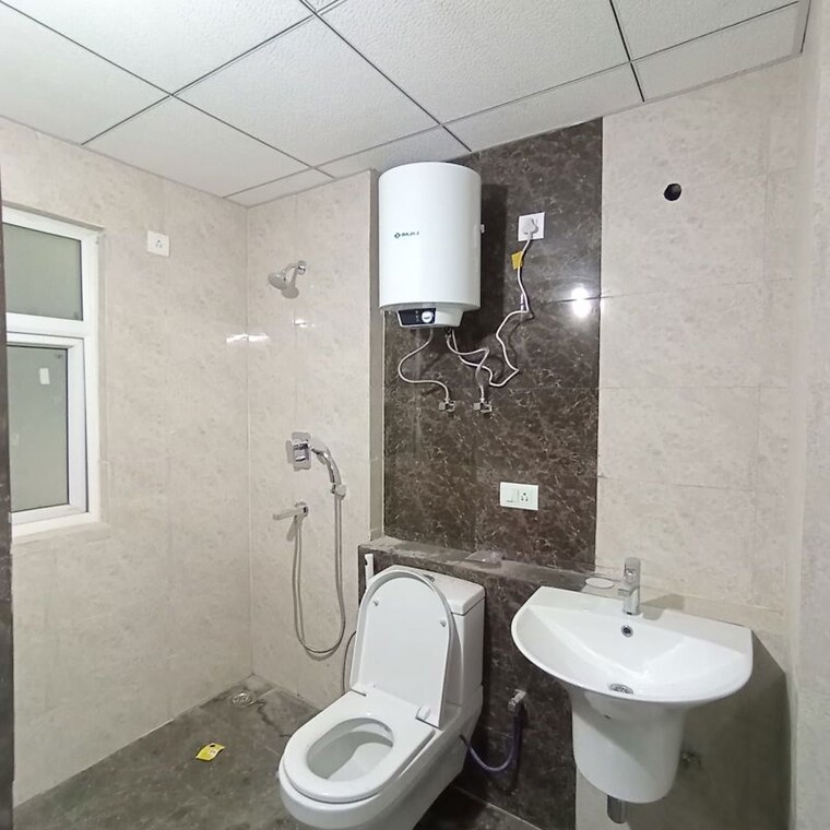 Bathroom, tulip-yellow 3 Bedroom 1704 Sq.Ft. Apartment In Sector 69 Gurgaon 9739325