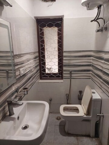 Attached Bathroom in 4 BHK Builder Floor at Asalatpur Village – for Sale