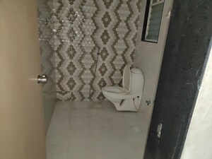 Bathroom in 1 BHK Apartment at Akshay Floria Building A, Vadgaon Budruk – for Rent