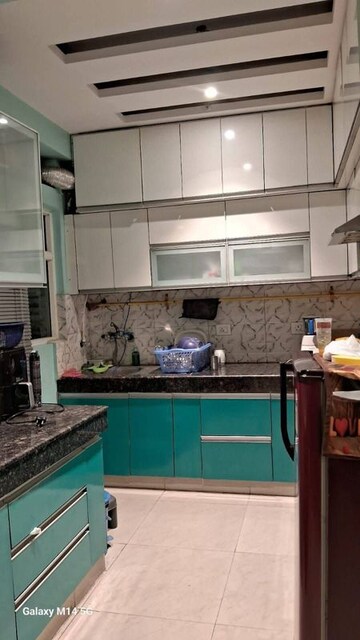 Kitchen in 2 BHK Apartment at Gaur City 2 - 14th Avenue, Sector 16c Greater Noida – for Rent