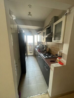 Kitchen in 2 BHK Apartment at Panchsheel Greens II, Sector 16 Greater Noida – for Rent