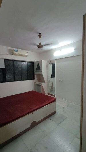 Bedroom in 2 BHK Apartment at Pranay Nagar CHS, Borivali West – for Rent