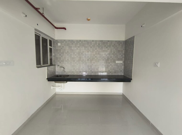 Kitchen, paranjape-trident-towers 1 Bedroom 650 Sq.Ft. Apartment In Wakad Pune 9740379